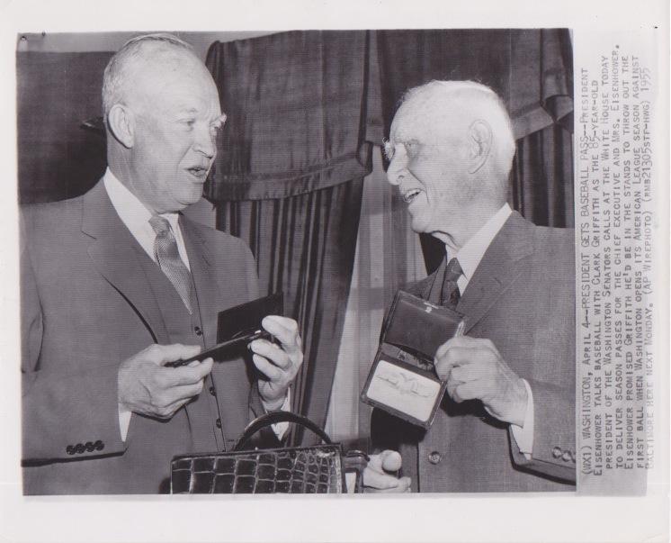Clark Griffith presents the pass to President Eisenhower at the White House